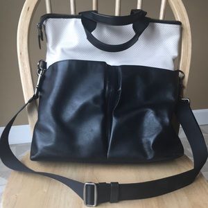 Black and cream Coach purse